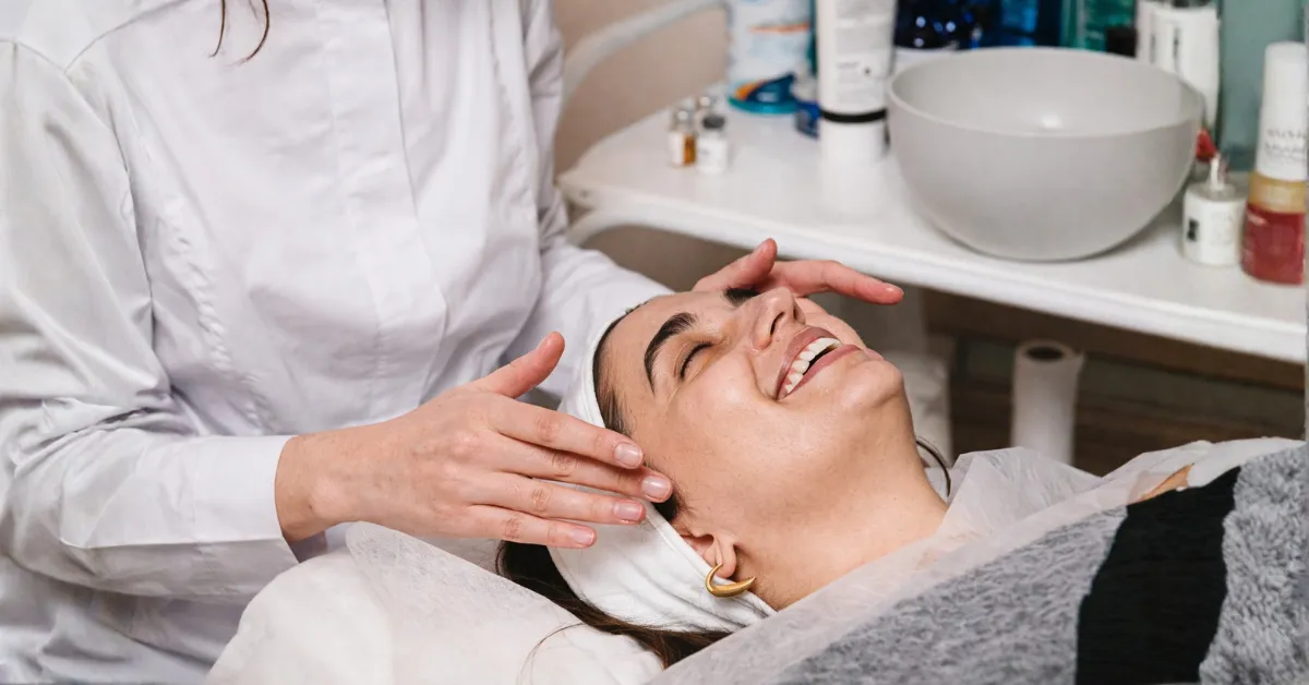  licensed esthetician performing professional facial treatment